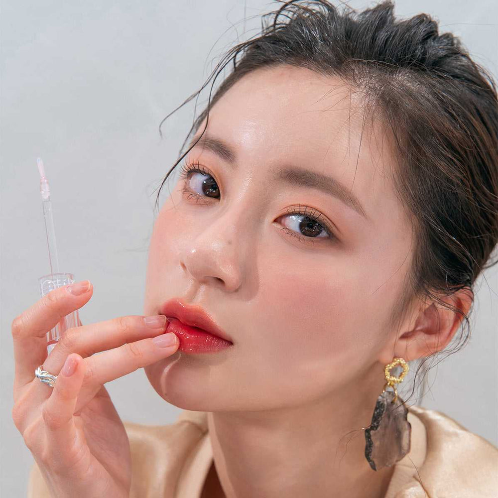 Glasting Water Dudak Parlatıcısı - Glasting Water Gloss 01 Sanho Crush - Romand - Vionine